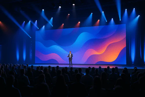 Scène immersive avec public captivé, éclairages dynamiques et écran principal.